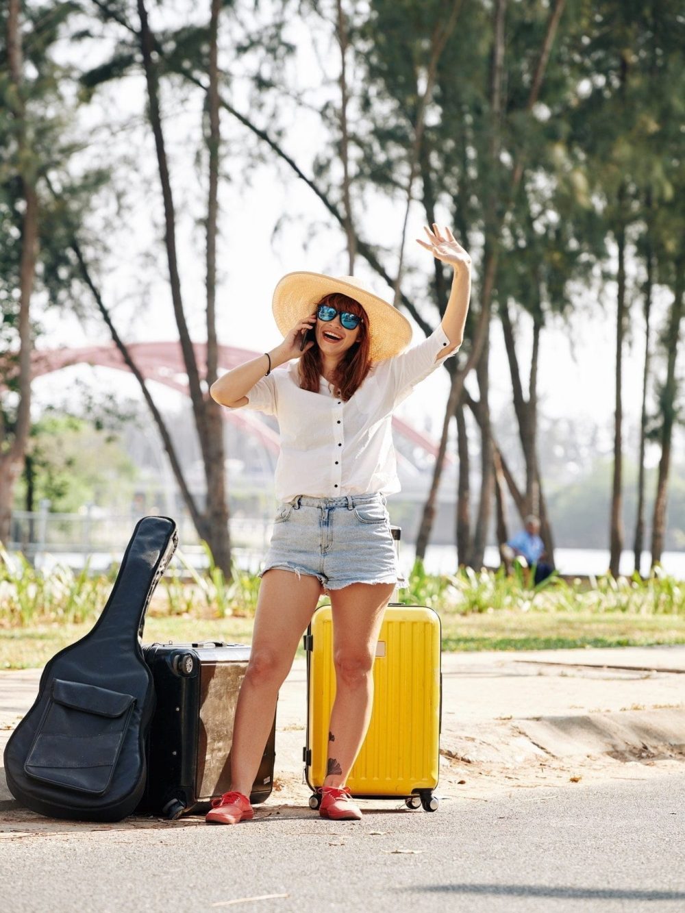 female-traveler-trying-to-chatch-car-1.jpg